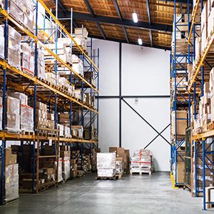 Shelves full of boxes in a warehouse.