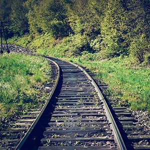 Rail goods path in the mountains on a background of mountain slopes and forest, Carpathians, Ukraine